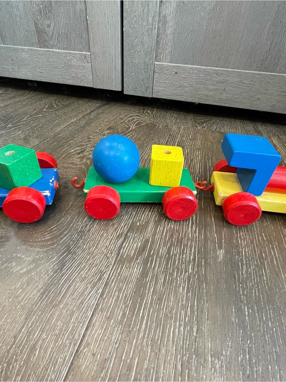 Wooden Pull-Along Toy Train with Blue, Green & Red Pieces